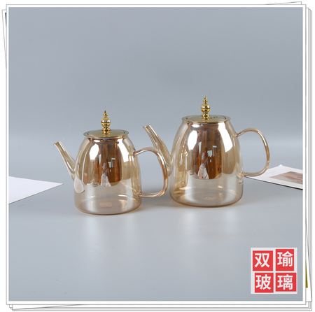 Electroplated gold teapot