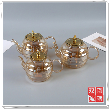 Electroplated gold teapot